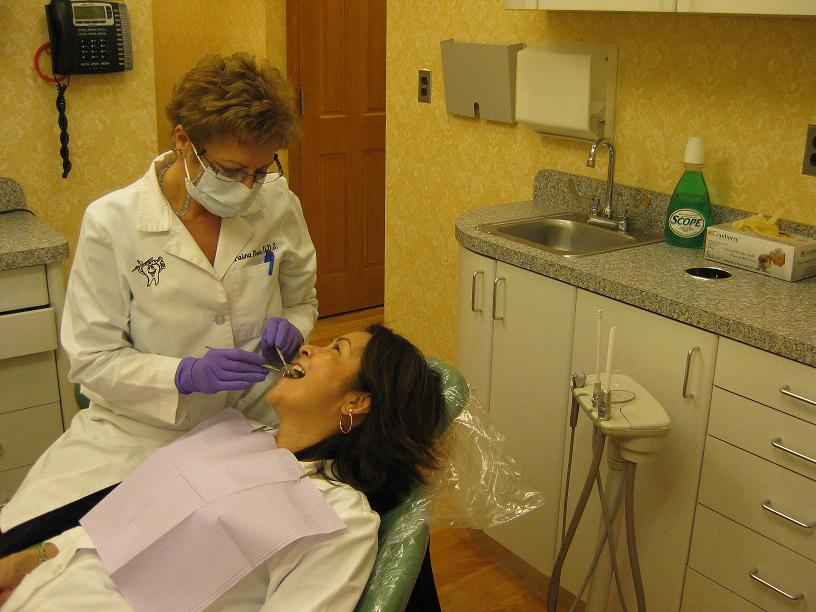 dr bram completing general dentistry on patient